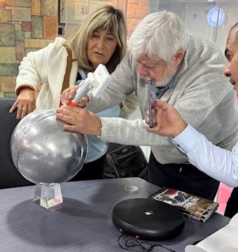 Paola Harris and Jaime Maussan with Buga Sphere